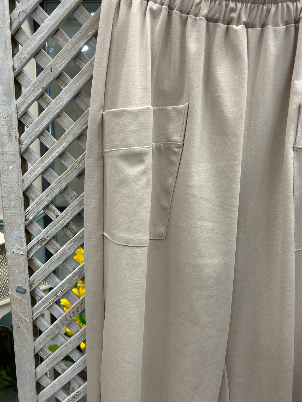 Cream Barrel Trousers with Feature Cuff Detail.