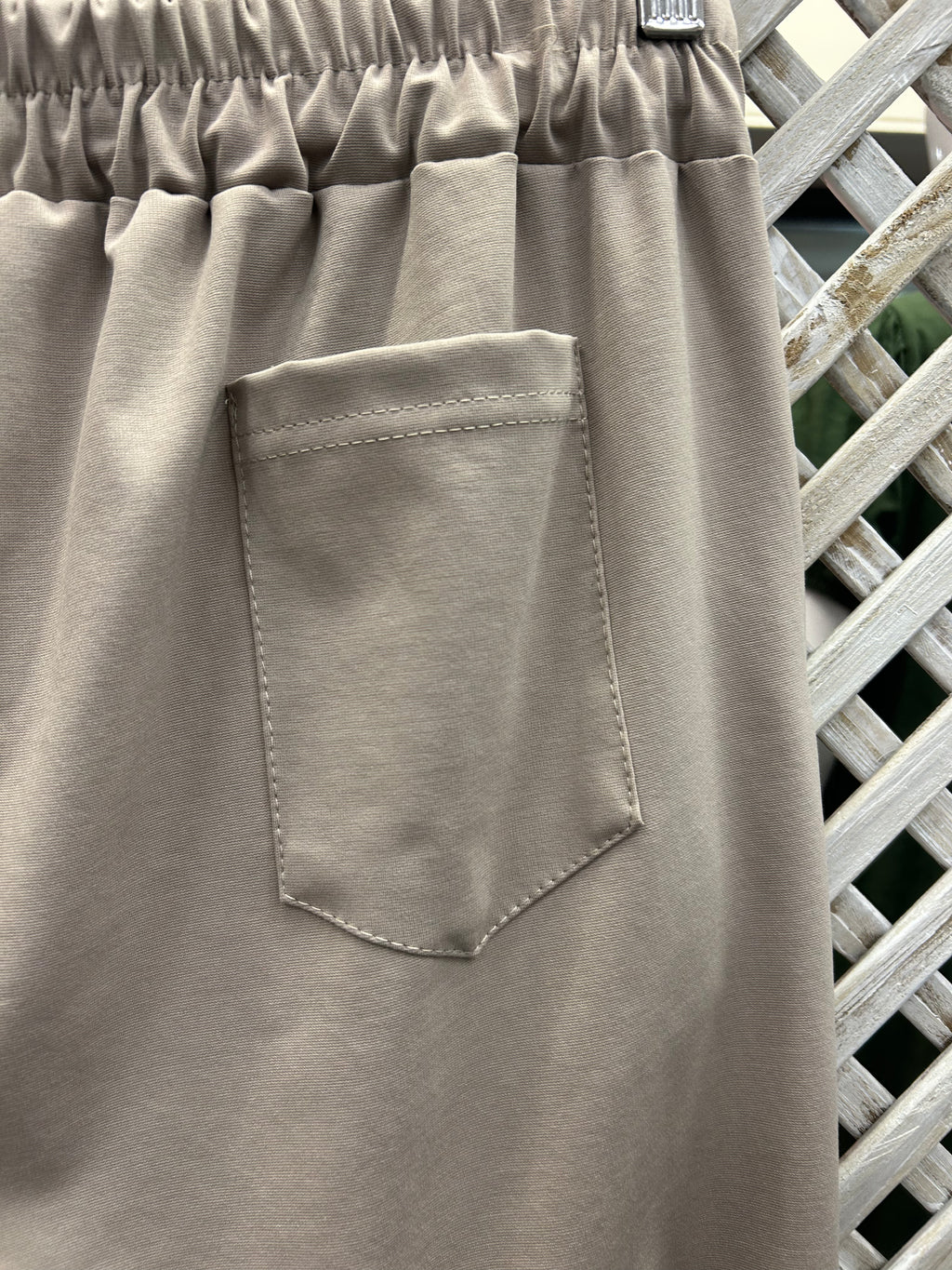 Mocha Pin Tuck Trousers.