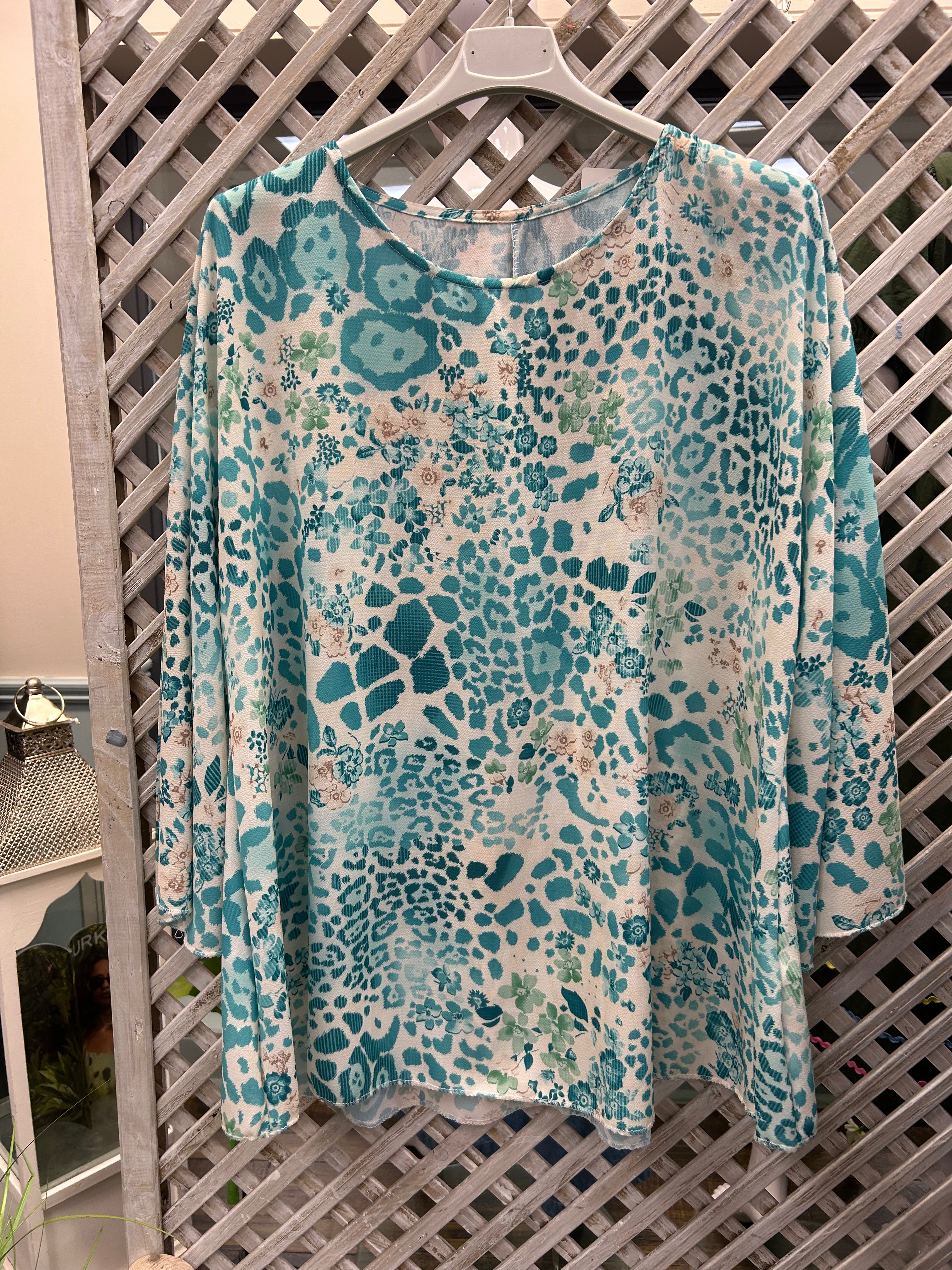 Turquoise Print Top with Wide Fliud Sleeve.