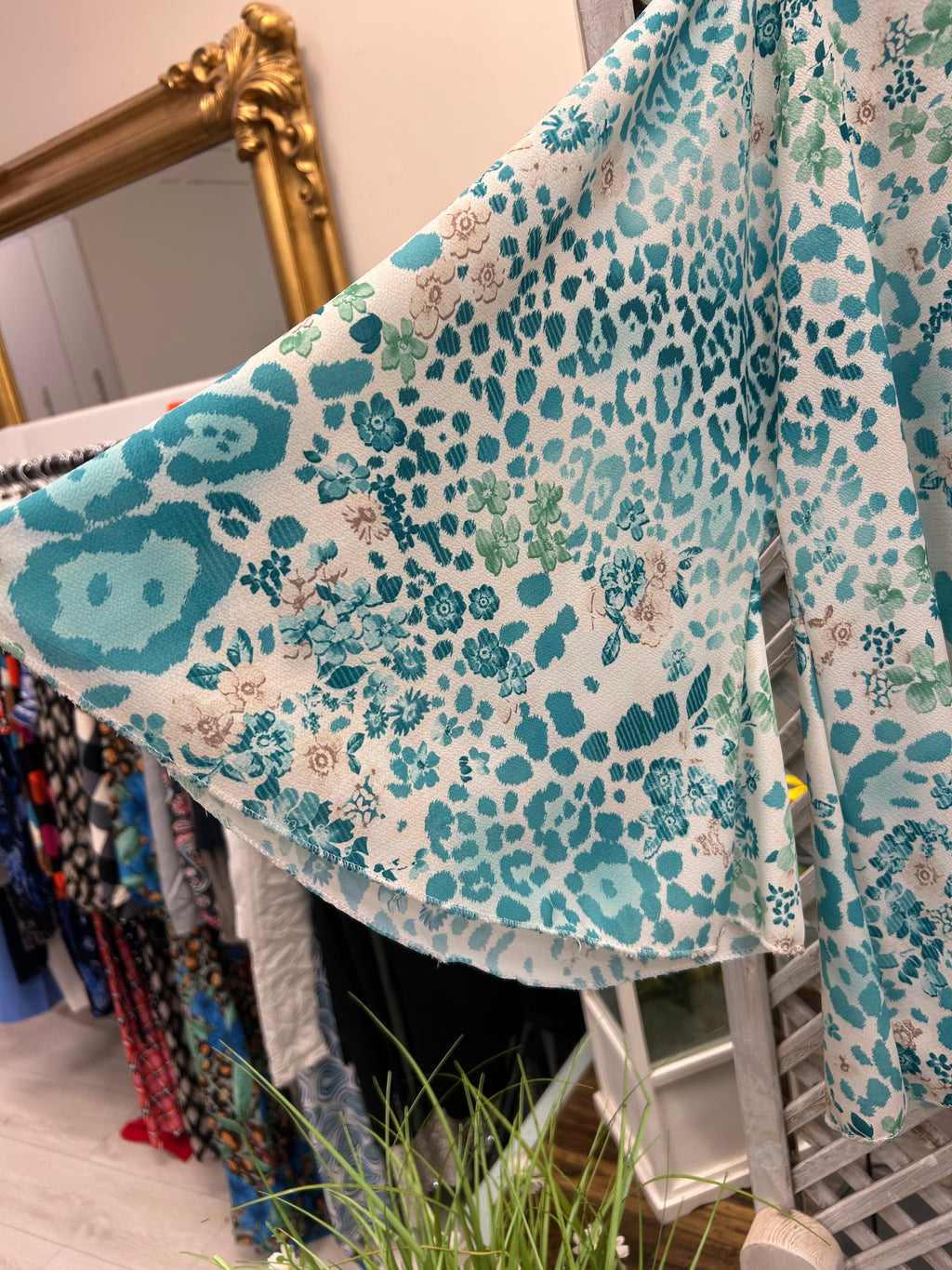 Turquoise Print Top with Wide Fliud Sleeve.